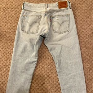 Light wash vintage Levi’s 501s.
